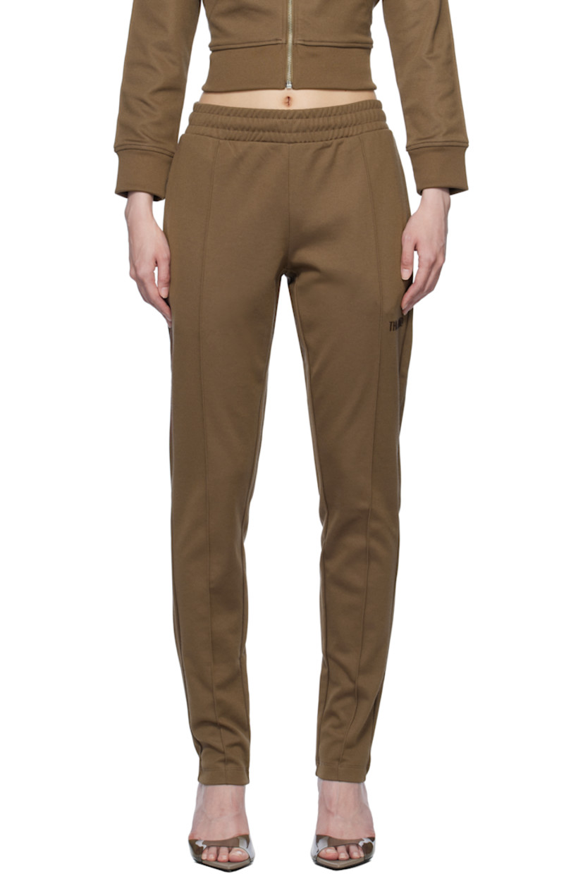 Cotton-blend jersey lounge pants.

· Concealed drawstring at elasticized waistband
· Two-pocket styling
· Pinched seam at legs
· Logo bonded at front

Supplier color: Brown