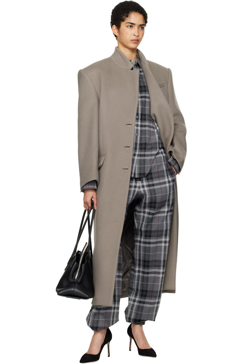 Wide-leg cotton-blend flannel trousers. Check pattern throughout. 

· Drawstring with logo hardware at elasticized waistband
· Logo patch at front waistband
· Four-pocket styling
· Mock-fly
· Elasticized cuffs

Supplier color: Grey