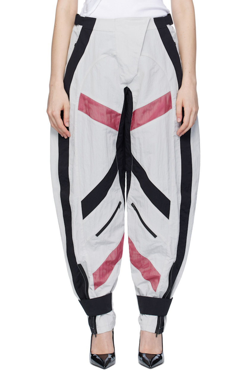 Crinkled nylon taffeta trousers.

· Cinch straps at waistband
· Two-pocket styling
· Zip fly
· Mesh panels at front and back legs
· Zip pocket at front legs
· Press-stud strap and zip vent at cuffs
· Full mesh lining

Supplier color: Multicolor