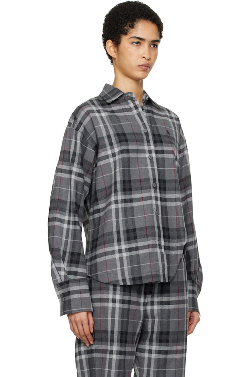 Cotton-blend flannel shirt. Check pattern throughout. 

· Spread collar
· Button closure
· Logo embroidered at chest
· Asymmetric shirttail hem
· Dropped shoulders
· Darts at single-button barrel cuffs

Supplier color: Grey