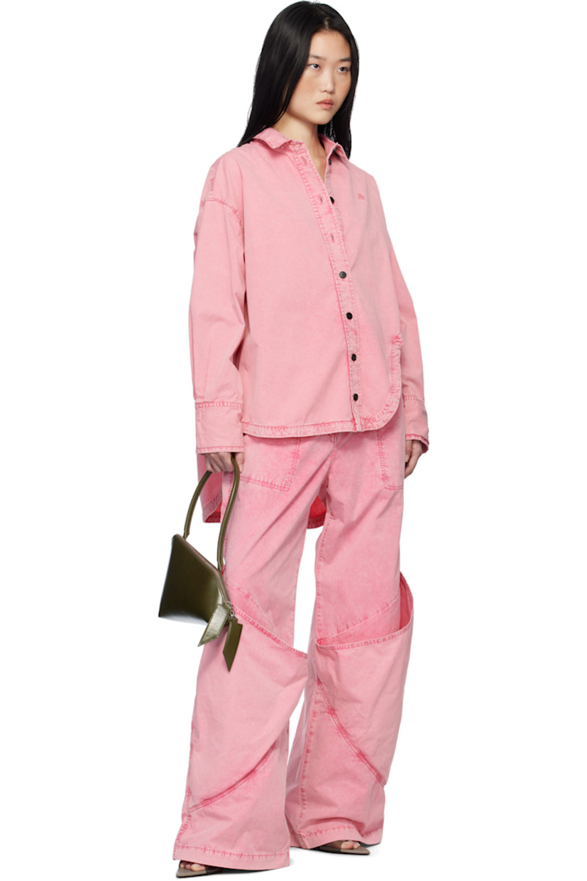 Non-stretch denim shirt. Fading throughout.

· Spread collar
· Button closure
· Logo embroidered at chest
· Asymmetric shirttail hem
· Dropped shoulders
· Pleated adjustable single-button barrel cuffs
· Box pleat at back yoke

Supplier color: Pink