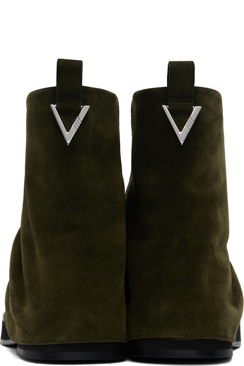 Ankle-high suede boots in khaki.

· Layered construction
· Square toe
· Pull-loop and logo hardware at heel collar
· Buffed leather lining
· Serrated edge at welt
· Stacked foam rubber midsole and heel
· Leather sole
· Heel: H1.75"

Supplier color: Powder green