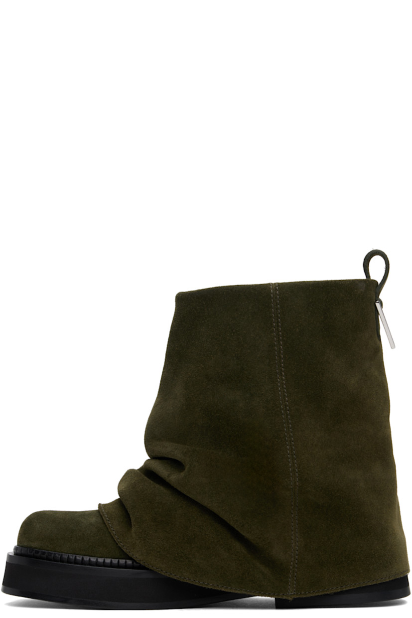Ankle-high suede boots in khaki.

· Layered construction
· Square toe
· Pull-loop and logo hardware at heel collar
· Buffed leather lining
· Serrated edge at welt
· Stacked foam rubber midsole and heel
· Leather sole
· Heel: H1.75"

Supplier color: Powder green