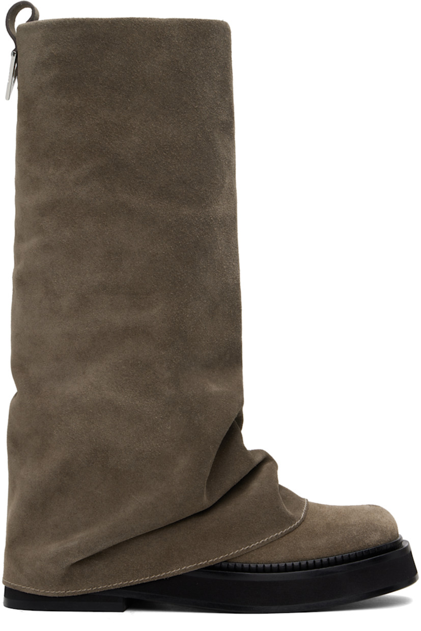 Mid-calf suede boots in taupe.

· Layered construction
· Square toe
· Pull-loop and logo hardware at heel collar
· Buffed calfskin lining
· Serrated edge at welt
· Stacked leather and rubber midsole and heel
· Leather sole
· Heel: H1.75"

Supplier color: Taupe