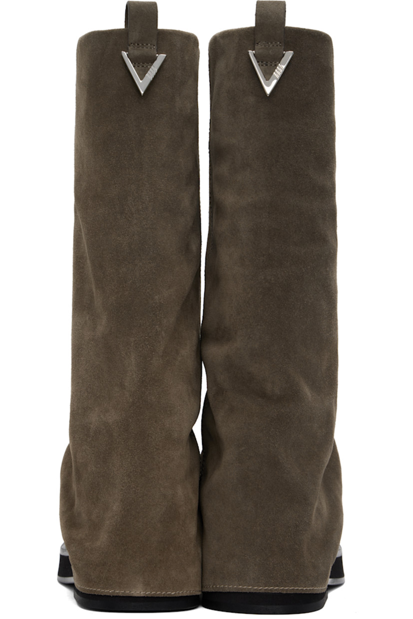 Mid-calf suede boots in taupe.

· Layered construction
· Square toe
· Pull-loop and logo hardware at heel collar
· Buffed calfskin lining
· Serrated edge at welt
· Stacked leather and rubber midsole and heel
· Leather sole
· Heel: H1.75"

Supplier color: Taupe