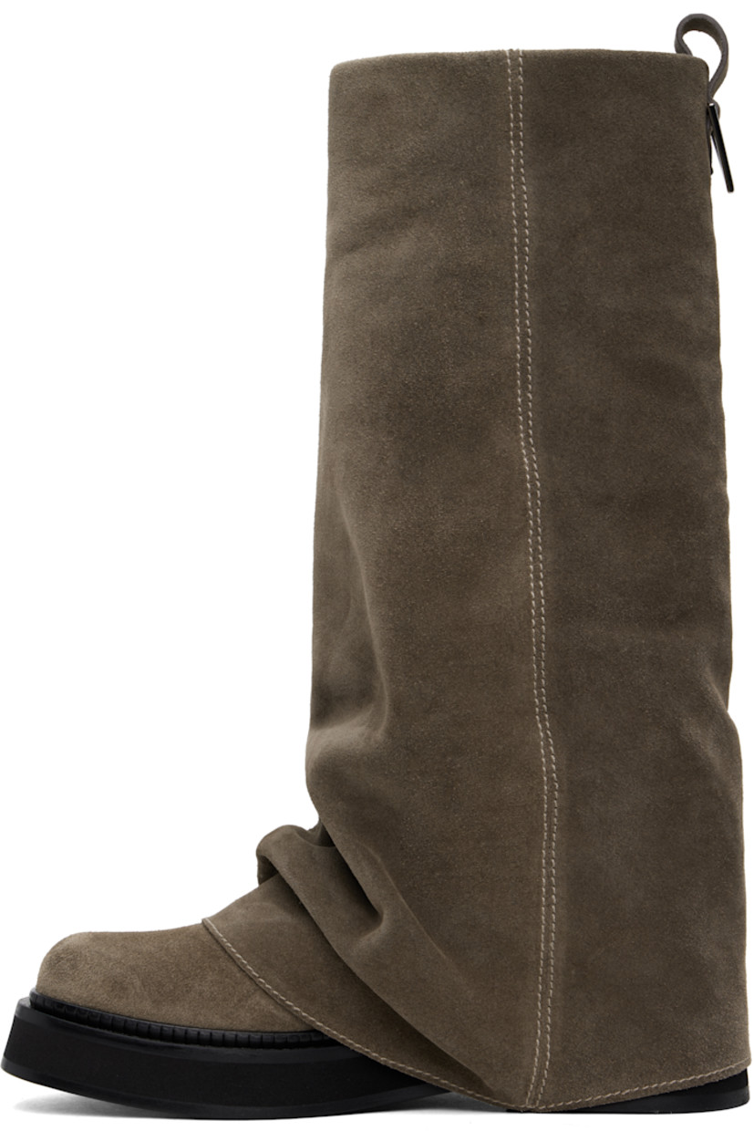 Mid-calf suede boots in taupe.

· Layered construction
· Square toe
· Pull-loop and logo hardware at heel collar
· Buffed calfskin lining
· Serrated edge at welt
· Stacked leather and rubber midsole and heel
· Leather sole
· Heel: H1.75"

Supplier color: Taupe
