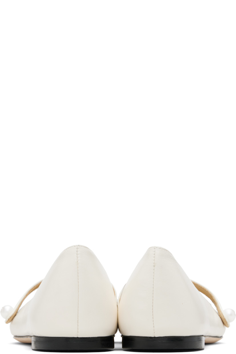 Grained nappa leather ballerina flats.

· Square patent leather cap toe
· Faux-pearl and logo hardware at fixed strap
· Nubuck sole

Supplier color: Latte/Latte