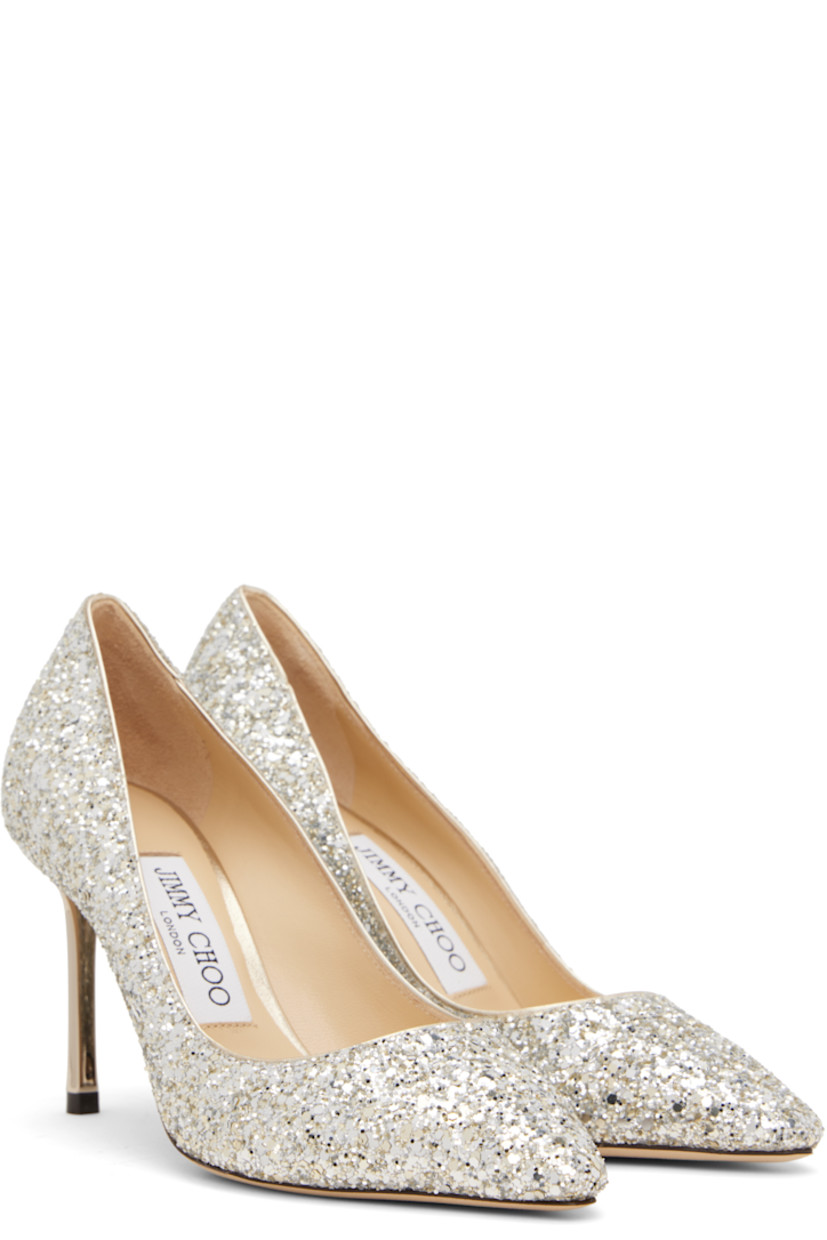 Glittered heels in silver tone.

· Pointed toe
· Grained leather lining
· Lacquered stiletto heel with rubber injection
· Nubuck sole
· Heel: H3.25"

Supplier color: Champagne