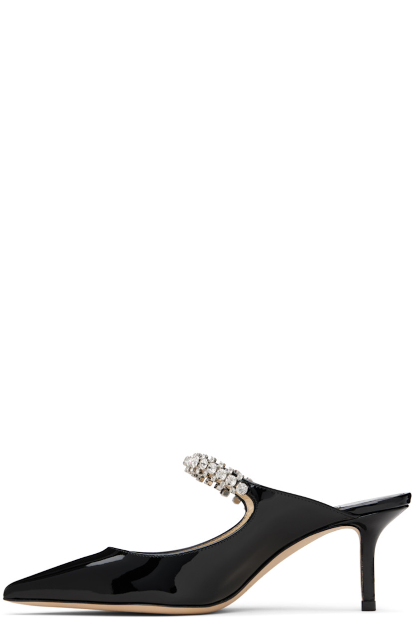 Patent leather mules.

· Pointed toe
· Crystal-cut accents at fixed strap
· Logo patch at grained leather footbed
· Covered stiletto heel
· Nubuck sole
· Heel: H2.5"

Supplier color: Black