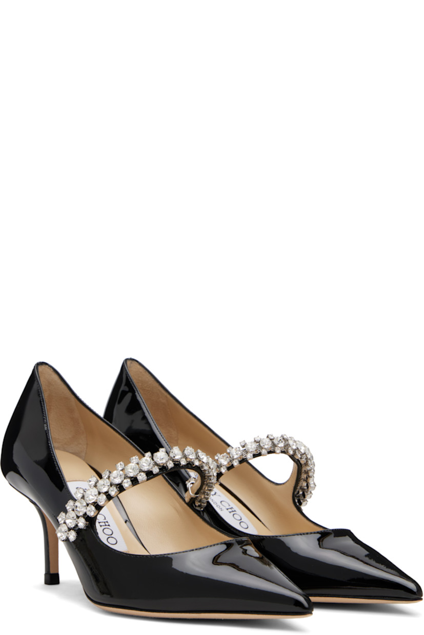 Patent leather heels.

· Pointed toe
· Crystal-cut accents at fixed strap
· Covered stiletto heel
· Nubuck sole
· Heel: H2.5"

Supplier color: Black
