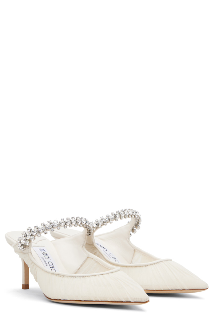 Sheer tulle mules.

· Ruching throughout
· Pointed toe
· Crystal-cut accents at fixed strap
· Logo patch at grained leather footbed
· Leather-covered stiletto heel
· Nubuck sole
· Heel: H2.5"

Available exclusively at SSENSE.

Supplier color: Ivory