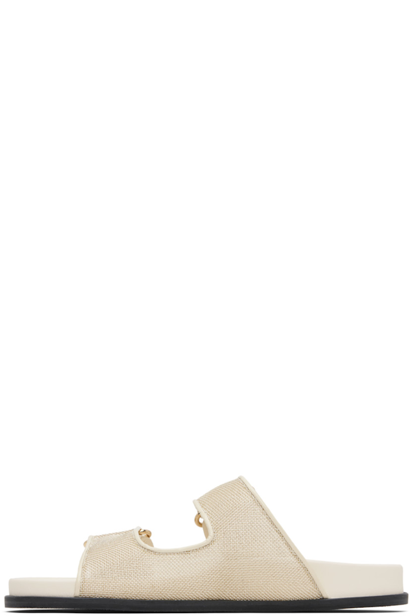 Semi-sheer mesh and buffed leather slip-on sandals in off-white and gold tone.

· Open toe
· Faux-pearl with logo hardware at velcro straps
· Treaded rubber sole

Supplier color: Champagne/Latte