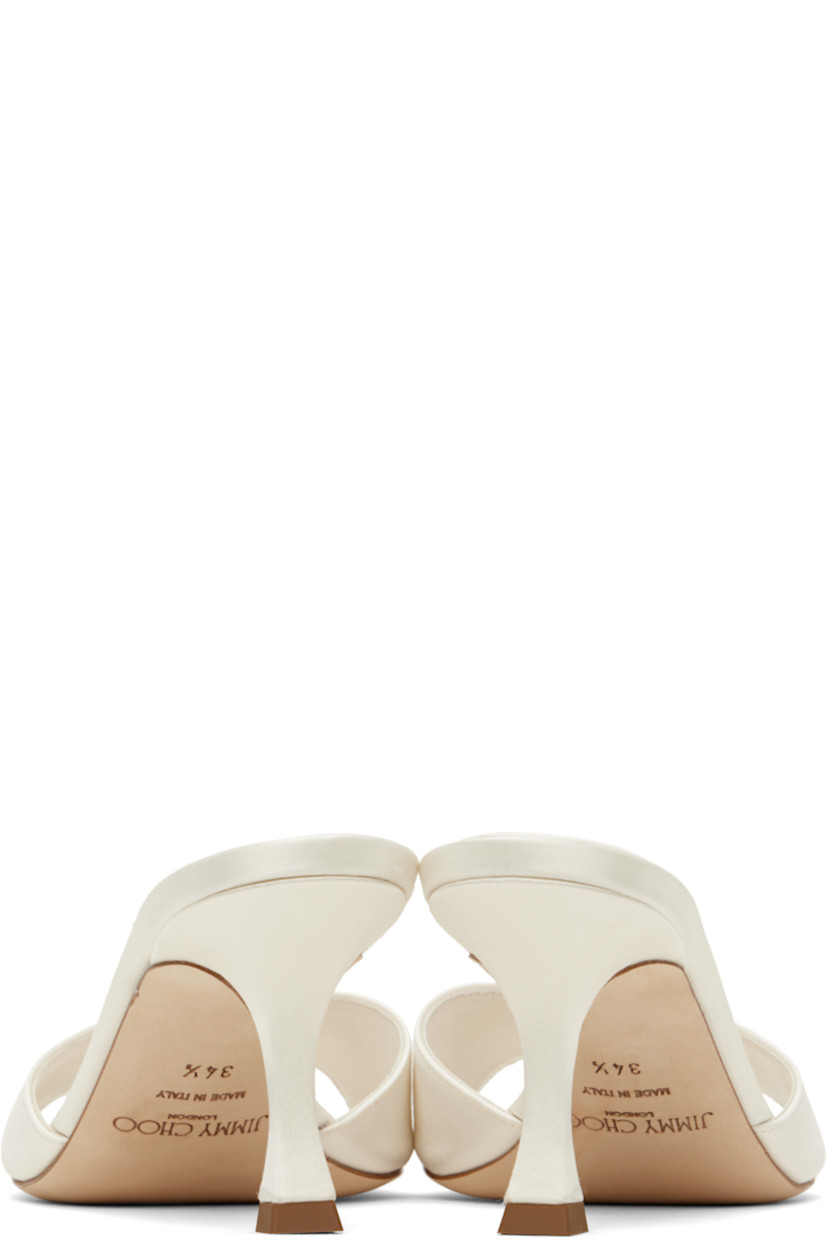 Satin heeled sandals in off-white.

· Open square toe
· Strap at vamp
· Logo patch at buffed leather footbed
· Covered spool heel with rubber injection
· Suede sole
· Heel: H2.75"

Supplier color: Ivory