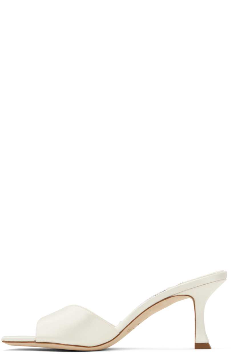 Satin heeled sandals in off-white.

· Open square toe
· Strap at vamp
· Logo patch at buffed leather footbed
· Covered spool heel with rubber injection
· Suede sole
· Heel: H2.75"

Supplier color: Ivory