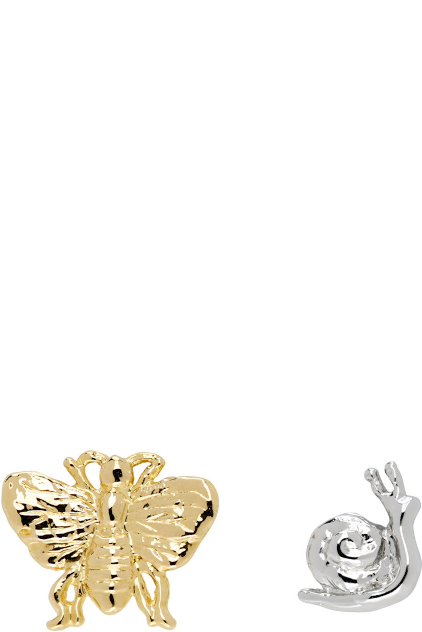Pair of mismatched stud earrings in gold-tone and palladium-plated brass.

· Post-stud fastening
· H0.5" x W0.75"; H1" x W1"

Supplier color: Gold/Silver