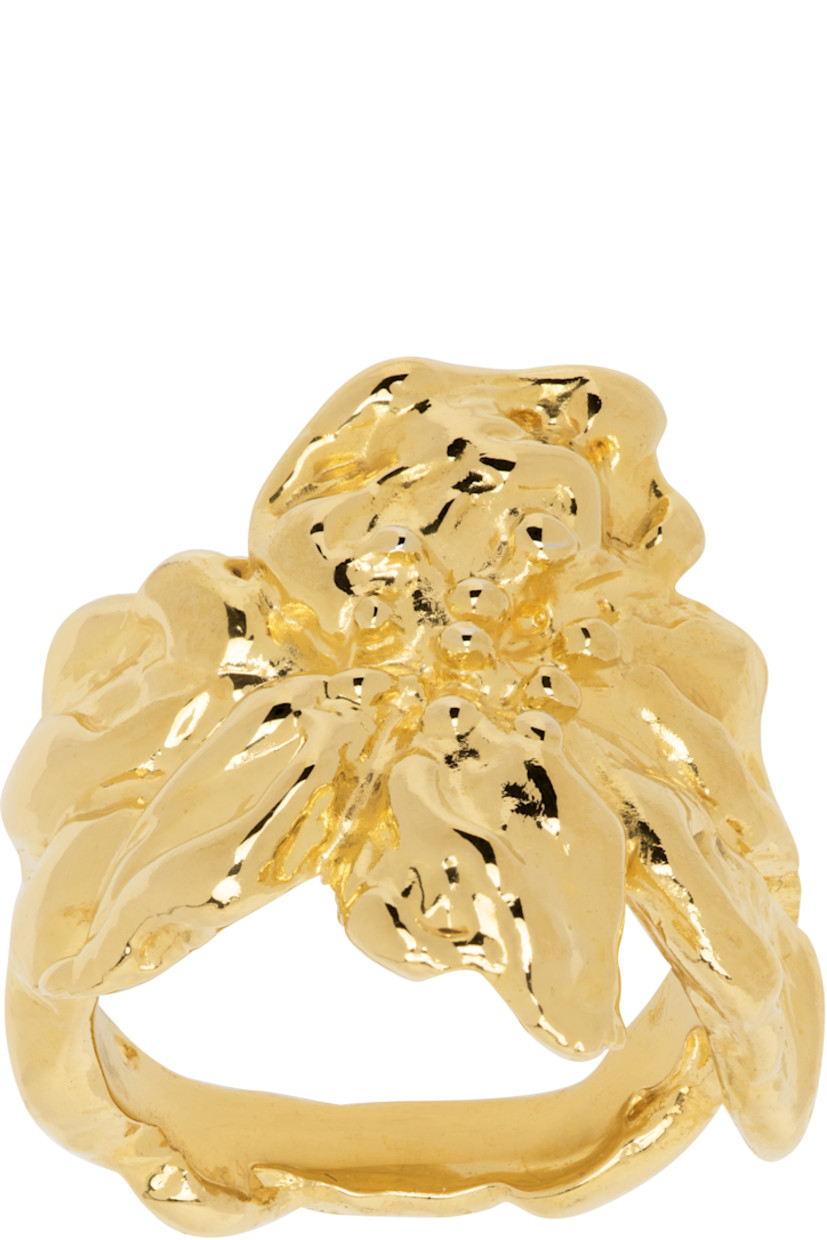 Textured ring in gold-tone palladium-plated brass. Floral graphic at face.

Supplier color: Gold