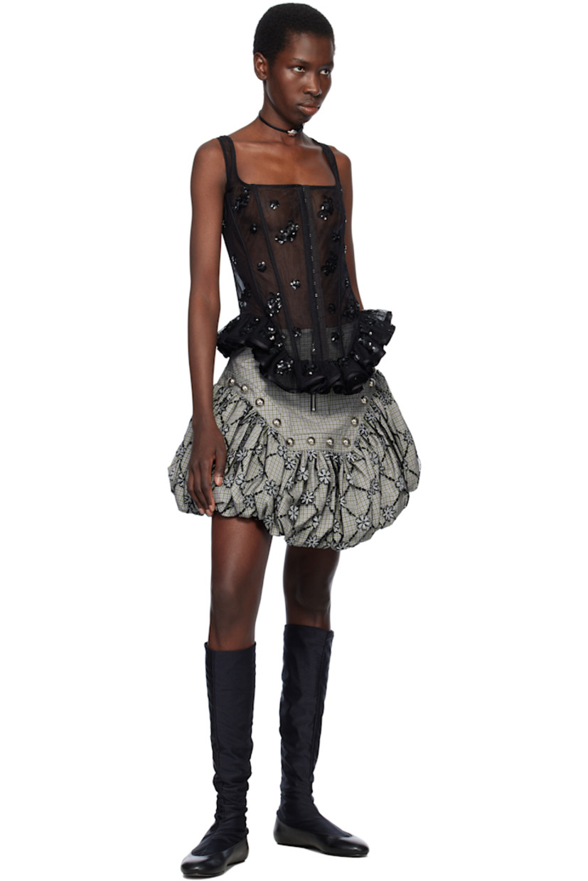 Cotton seersucker and nylon-blend tulle miniskirt. Jacquard check pattern throughout.

· Studded hardware at drop waist
· Exposed zip fly
· Glittered flocked floral pattern at bubble hem
· Fully lined
· Silver-tone hardware

Supplier color: Green tartan/Black