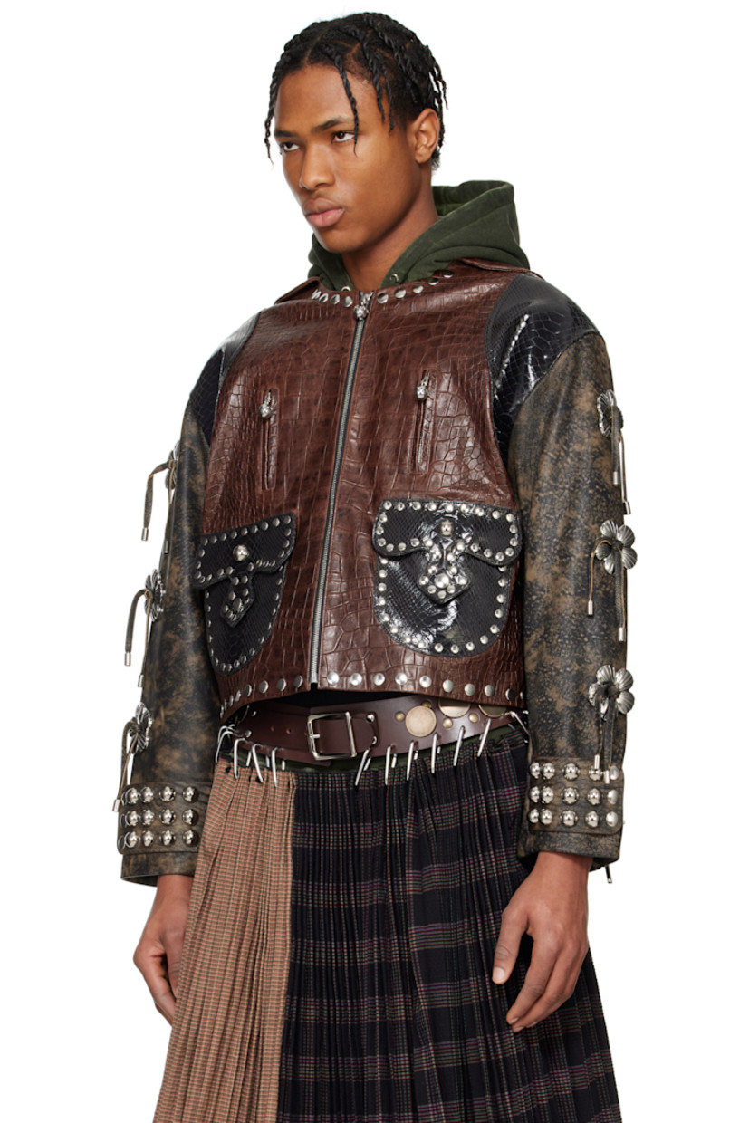 Croc-embossed, snake-embossed, and grained lambskin jacket. Smudging and studs throughout. 

· Paneled construction
· Round neck 
· Zip closure
· Zip and flap pockets
· Lace-up detailing at side seams
· Floral hardware at sleeves
· Adjustable press-stud tab at cuffs
· Zip expansion panel at cuffs
· Press-stud storm flap at back collar
· Full satin lining
· Silver-tone hardware

Supplier color: Brown/Black