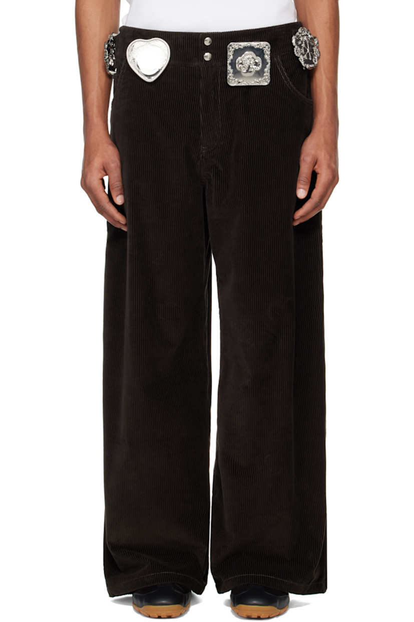 Oversized BCI-certified cotton corduroy trousers. 

· Detachable graphic hardware at waistband
· Five-pocket styling
· Zip-fly
· Zip vent at cuffs

Supplier color: Green