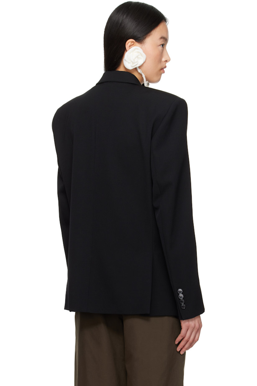 Wool twill blazer. 

· Notched lapel
· Two-button closure
· Welt pocket and flap pockets
· Padded shoulders
· Four-button surgeon's cuffs 
· Twin vents at back hem
· Welt pockets at interior
· Full silk damask lining
· Horn hardware

Supplier color: Black