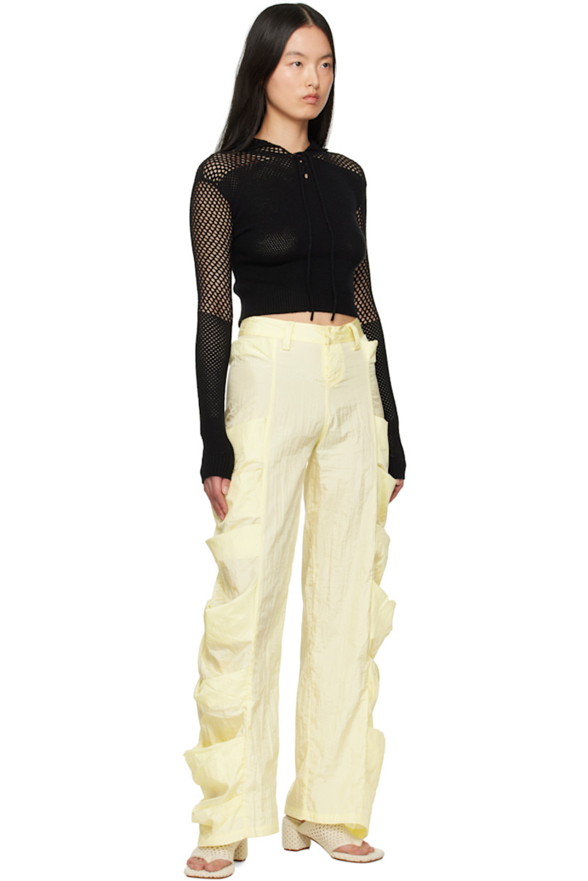 Handcrafted nylon taffeta trousers. 

· Belt loops
· Two-pocket styling
· Button fly
· Draped patch pockets at outseams

Supplier color: Banana