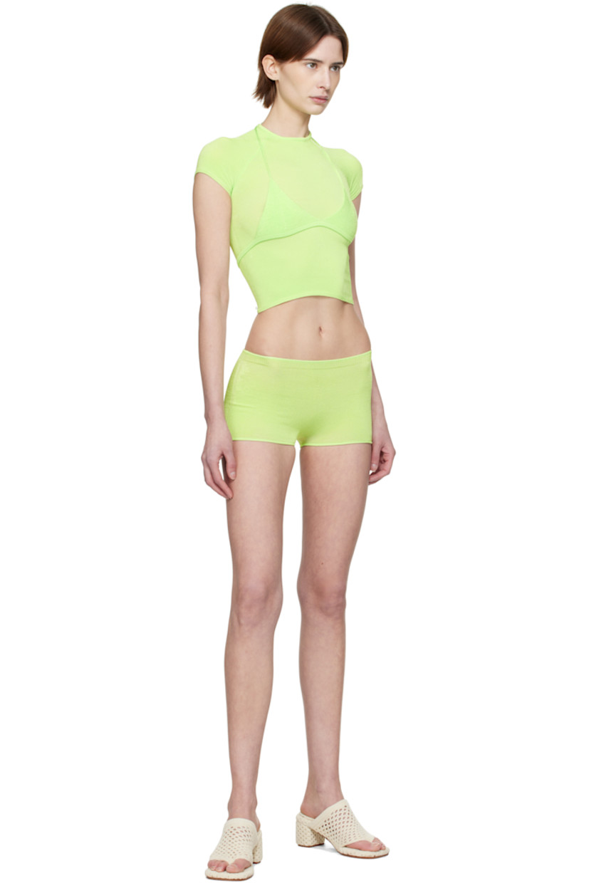 Handcrafted knit stretch rayon bra. 

· V-neck
· Rib-knit hem
· Self-tie halter straps

Handcrafted knit stretch rayon T-shirt. 

· Rib-knit cowl neck, hem, and cuffs
· Cap sleeves
· Logo patch at back hem

Supplier color: Mint