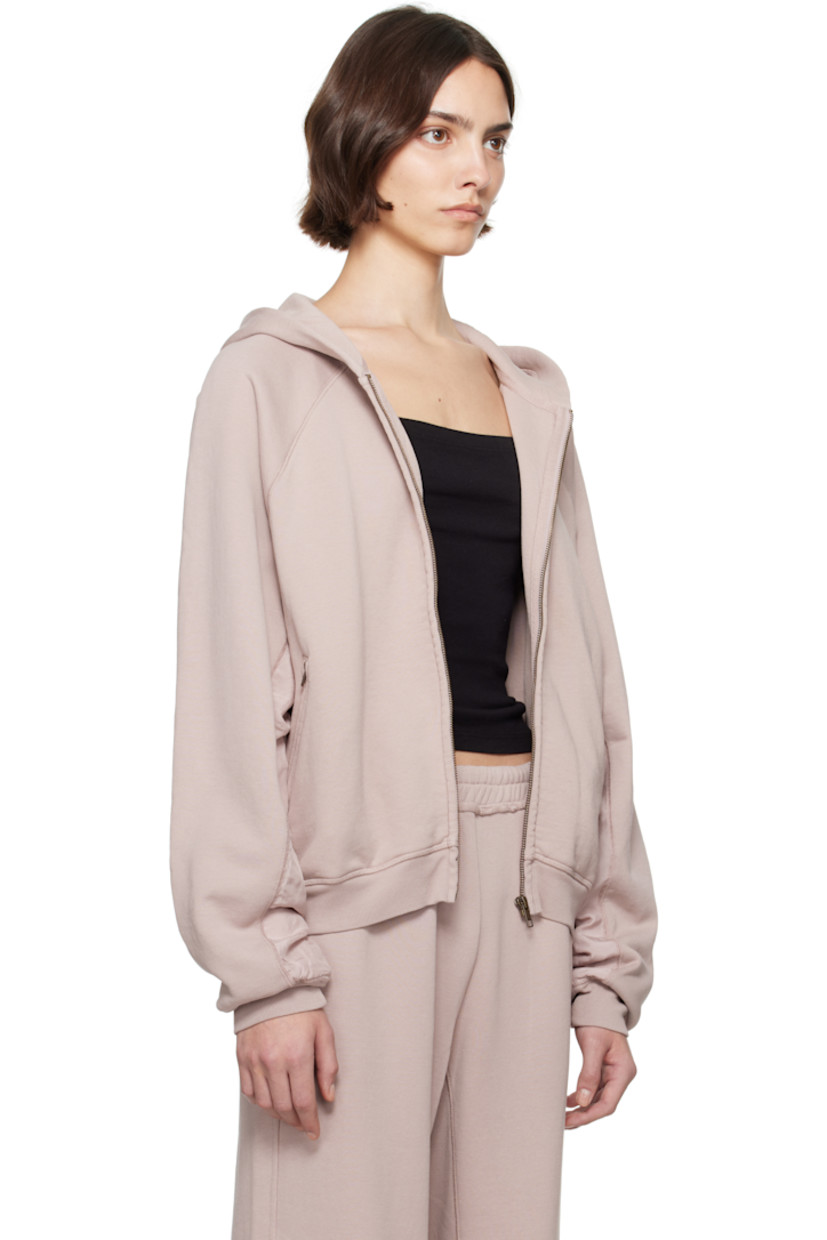 Organic cotton jersey hoodie.

· Zip closure
· Zip pockets
· Rib-knit hem and cuffs
· Crinkled cupro-blend taffeta panel at side seams
· Raglan sleeves
· Fully lined

Supplier color: Fawn