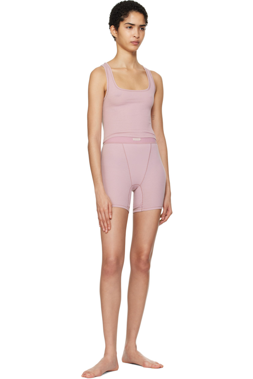 Stretch cotton ribbed jersey tank top. Lightweight and breathable.

· Square neck
· Cropped hem
· Logo patch at back collar

Supplier color: Dusk