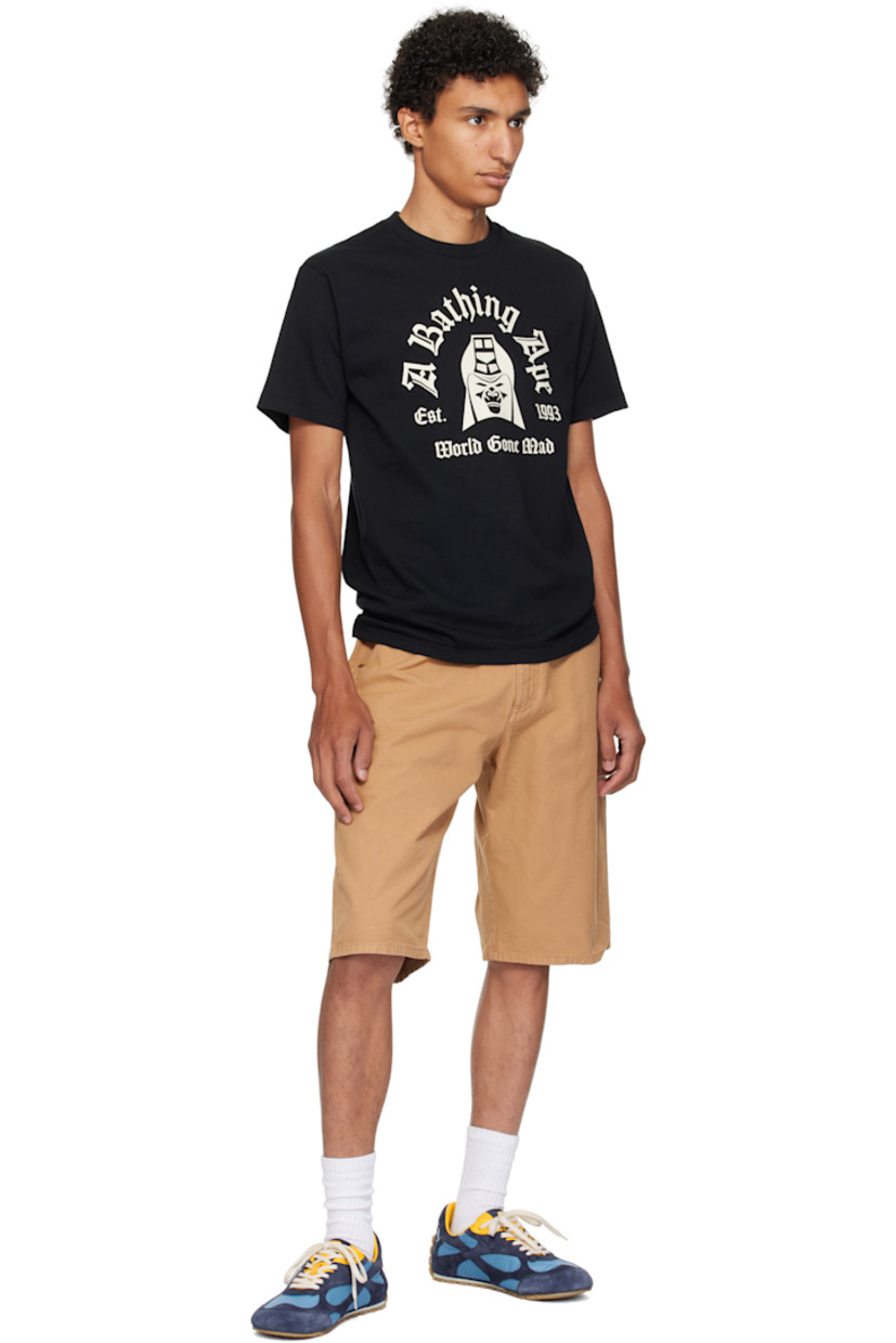 Cotton jersey T-shirt. 

· Rib-knit crewneck
· Logo, graphic, and text printed at front 
· Logo flag at cuff

Supplier color: Black