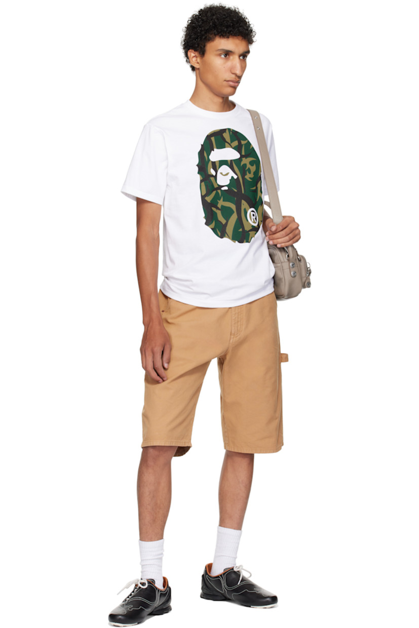 Cotton jersey T-shirt. 

· Rib-knit crewneck
· Logo graphic printed at front and back
· Logo flag at cuff

Supplier color: White/Green