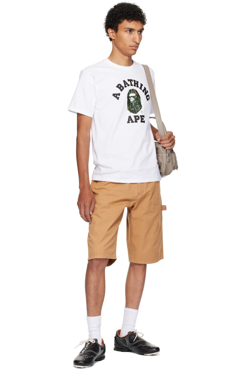 Cotton jersey T-shirt. 

· Rib-knit crewneck
· Logo graphic printed at front
· Logo flag at cuff

Supplier color: White/Green