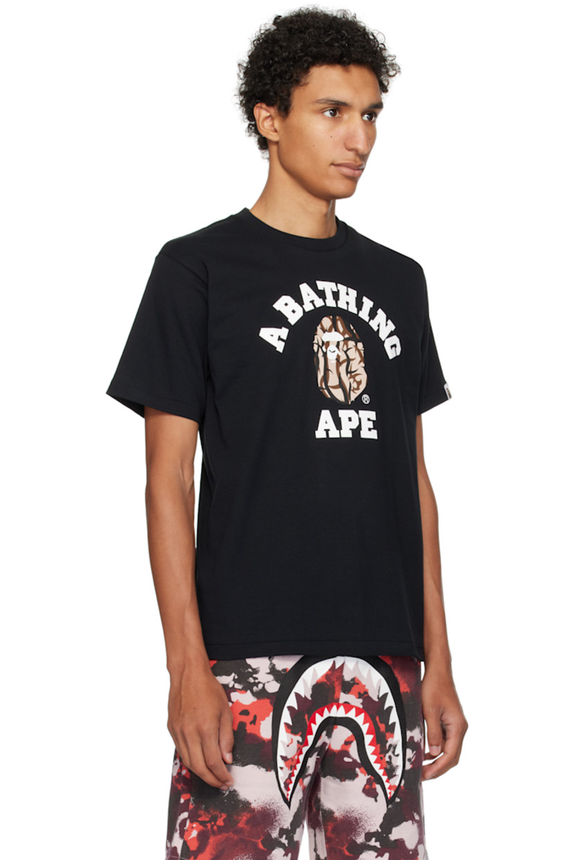 Cotton jersey T-shirt. 

· Rib-knit crewneck
· Logo graphic printed at front
· Logo flag at cuff

Supplier color: Black/Beige