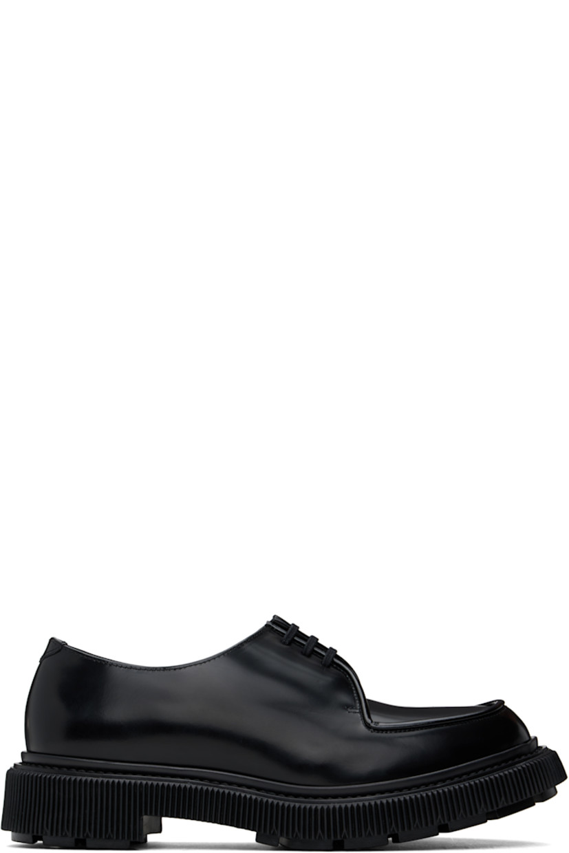 Polished leather derbys in black.

· Moc toe
· Lace-up closure
· Logo printed at padded leather footbed
· Suede and buffed leather lining
· Topstitching at welt
· Textured rubber midsole
· Treaded rubber sole

Supplier color: Black