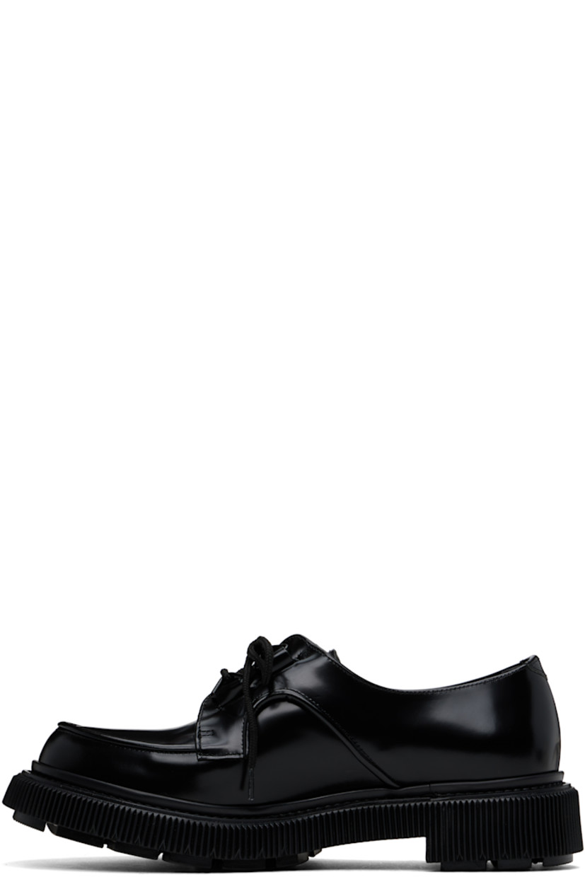Polished leather derbys in black. 

· Moc toe
· Lace-up closure
· Logo printed at padded leather footbed
· Suede and buffed leather lining
· Topstitching at welt
· Textured rubber midsole
· Treaded rubber sole

Supplier color: Black