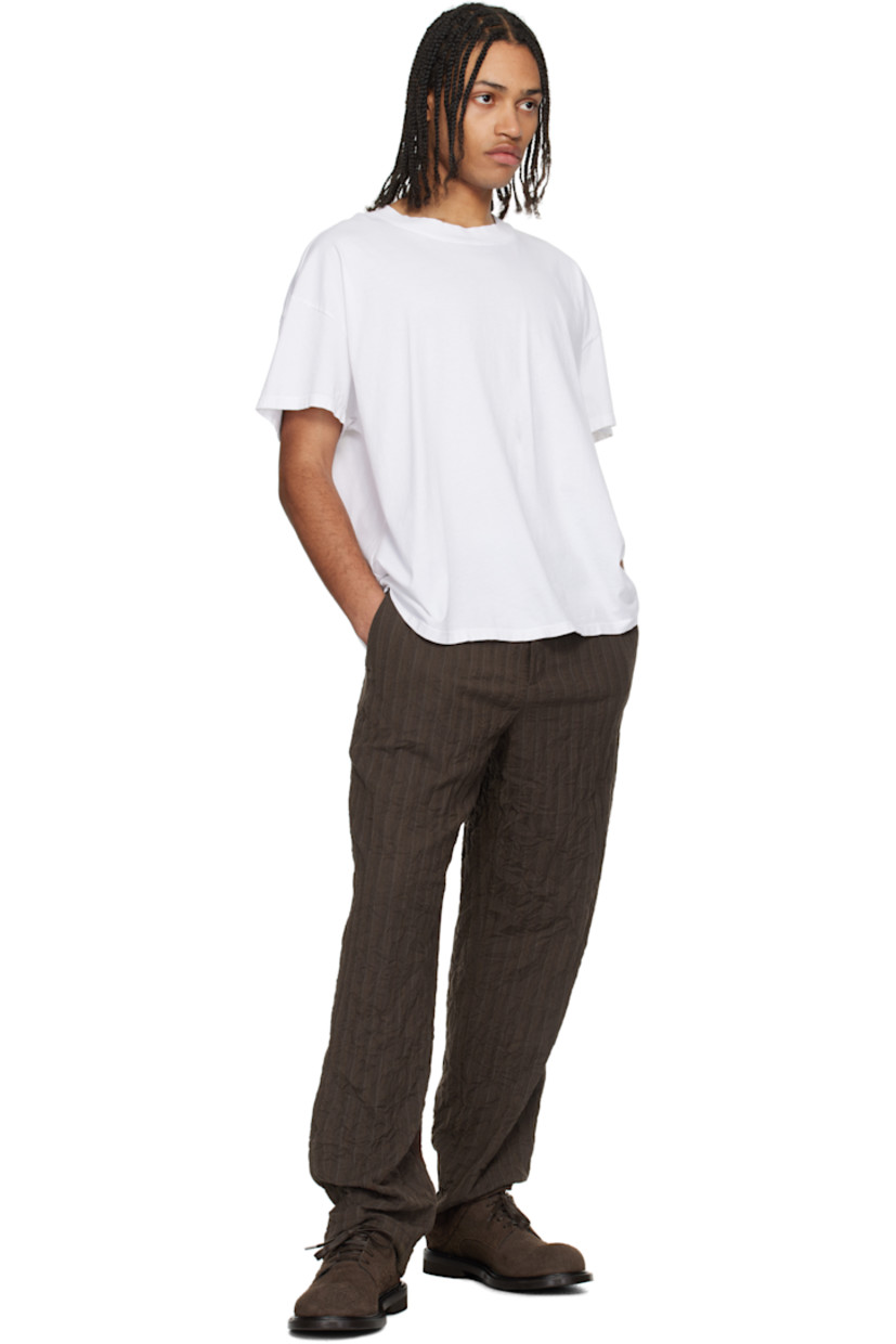 Pack of three cotton jersey T-shirts. 

· Rib-knit crewneck
· Dropped shoulders

Supplier color: White