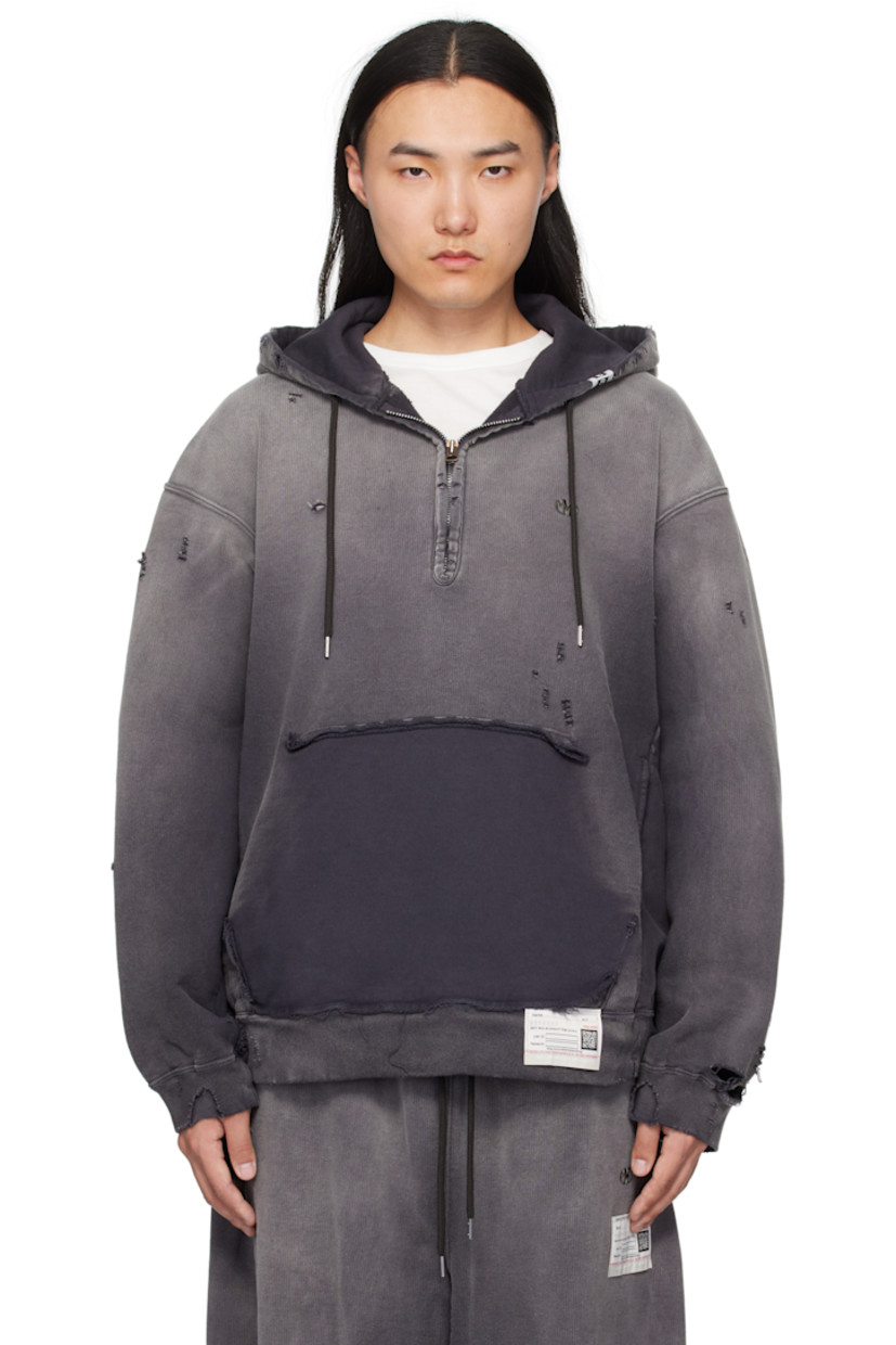 French terry hoodie. Fading, distressing, and exposed seams throughout. 

· Logo patch and drawstring at hood
· Half-zip closure
· Logo embroidered at chest
· Seam pockets
· Logo patch at front hem 
· Rib-knit hem and cuffs
· Dropped shoulders

Supplier color: Black