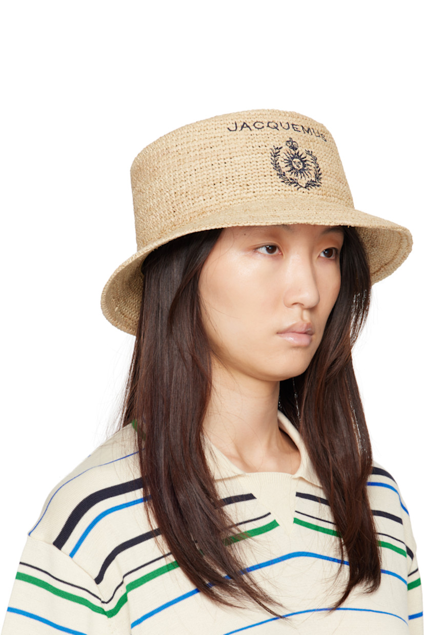 Woven raffia beach hat.

· Logo and graphic embroidered at face
· Grosgrain browband

Supplier color: Natural