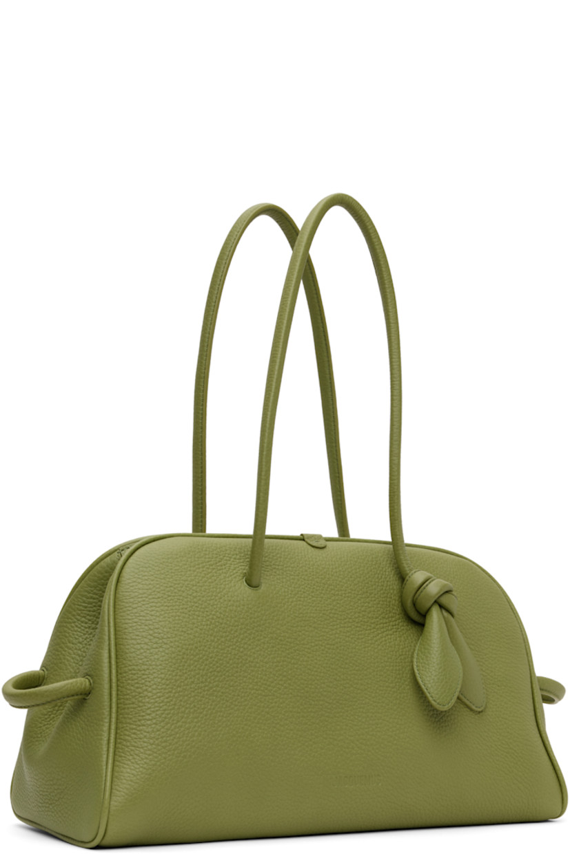 Grained calfskin top handle bag in green.

· Rolled carry handles
· Knotted accent and embossed logo at face
· Loop at sides
· Magnetic fastening at two-way zip closure
· Zip pocket at interior
· Cotton twill lining
· H9" x W15.25" x D6.5"

Part of the La Croisière collection.

Supplier color: Green