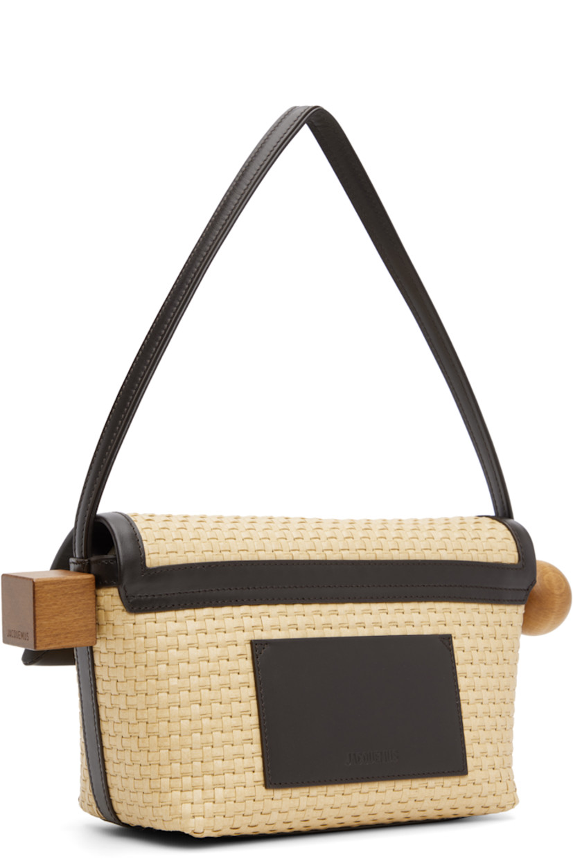 Woven cotton and grained lambskin shoulder bag.

· Fixed shoulder strap
· Logo-embossed card slot at back 
· Wooden hardware at sides
· Press-release flap closure
· Zip pocket at two-compartment interior 
· Patch pocket 
· Cotton twill lining
· Gold-tone hardware
· H6" x W10.5" x D4.5"

Part of the La Croisière collection. 

Supplier color: Natural/Dark brown