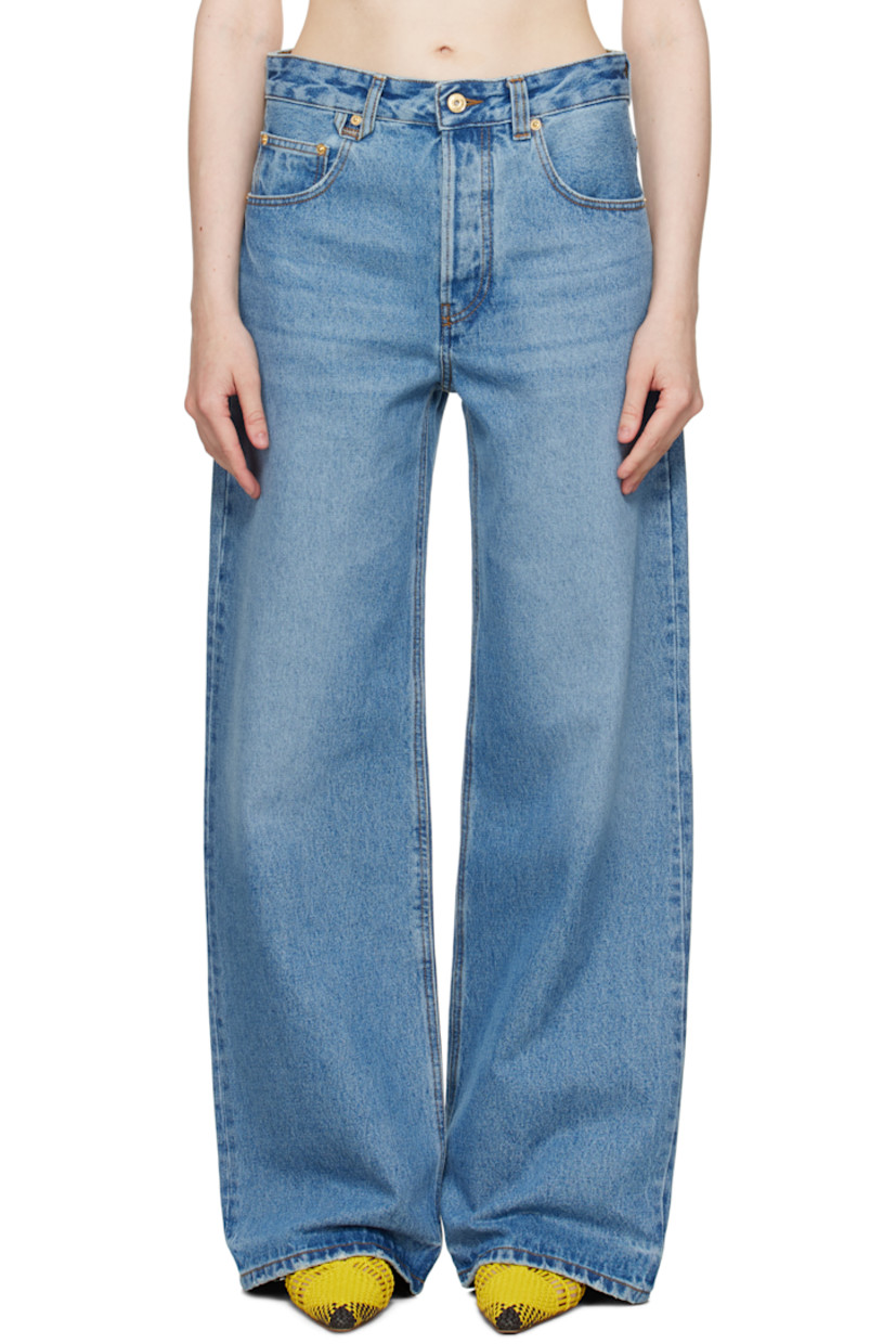 Washed non-stretch denim jeans. Whiskering and subtle distressing throughout. 

· Wide-leg 
· Mid-rise 
· Belt loops
· Logo locker loop at front waistband 
· Five-pocket styling
· Button fly 
· Leather logo patch at back waistband 
· Logo-engraved gold-tone hardware
· Contrast stitching in tan 

Part of the La Croisière collection.

Supplier color: Blue/Tabac