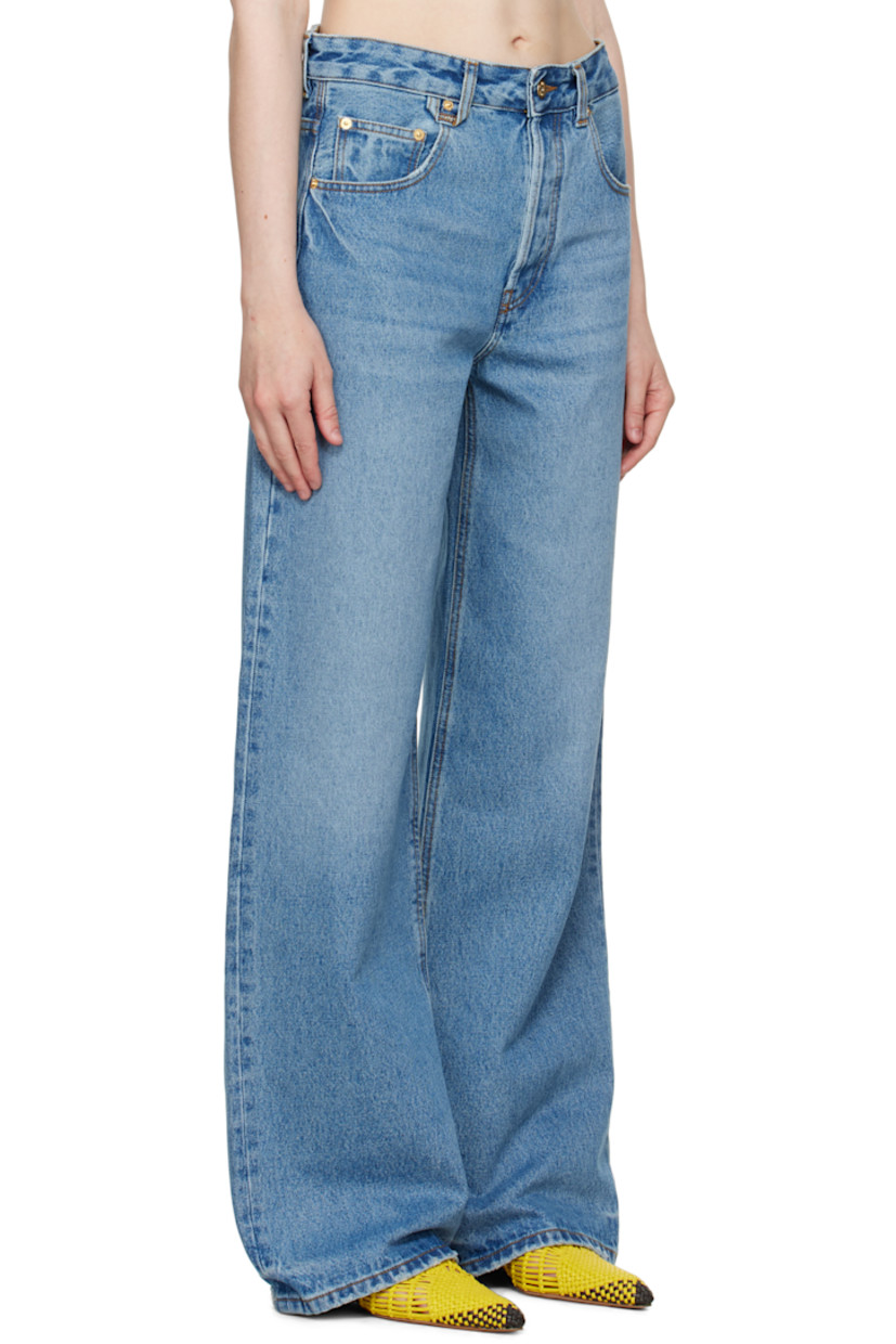 Washed non-stretch denim jeans. Whiskering and subtle distressing throughout. 

· Wide-leg 
· Mid-rise 
· Belt loops
· Logo locker loop at front waistband 
· Five-pocket styling
· Button fly 
· Leather logo patch at back waistband 
· Logo-engraved gold-tone hardware
· Contrast stitching in tan 

Part of the La Croisière collection.

Supplier color: Blue/Tabac