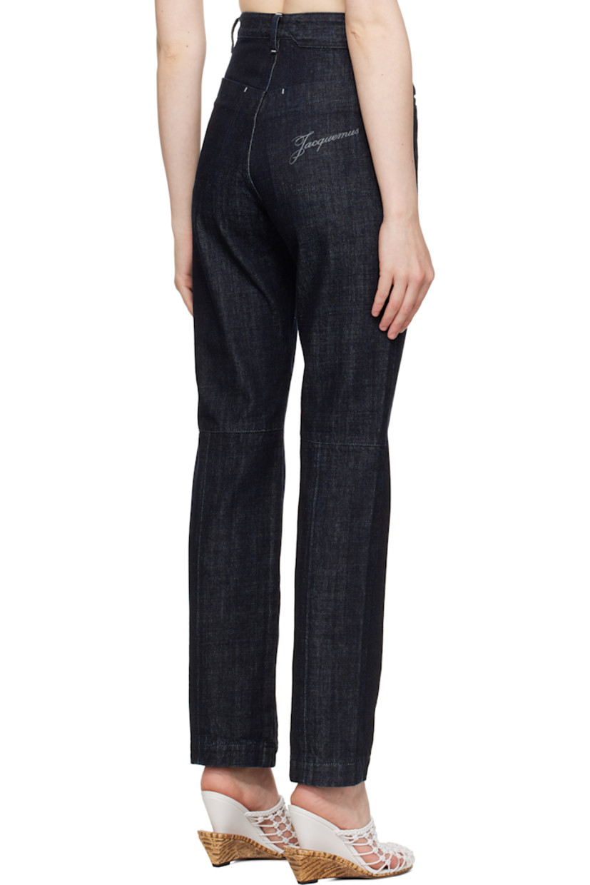 Non-stretch denim jeans. 

· Belt loops
· Logo locker loop at front waistband 
· Four-pocket styling
· Button fly
· Logo printed at back pocket 
· Logo-engraved silver-tone hardware
· Contrast stitching in white  

Part of the La Croisière collection.

Supplier color: Dark navy