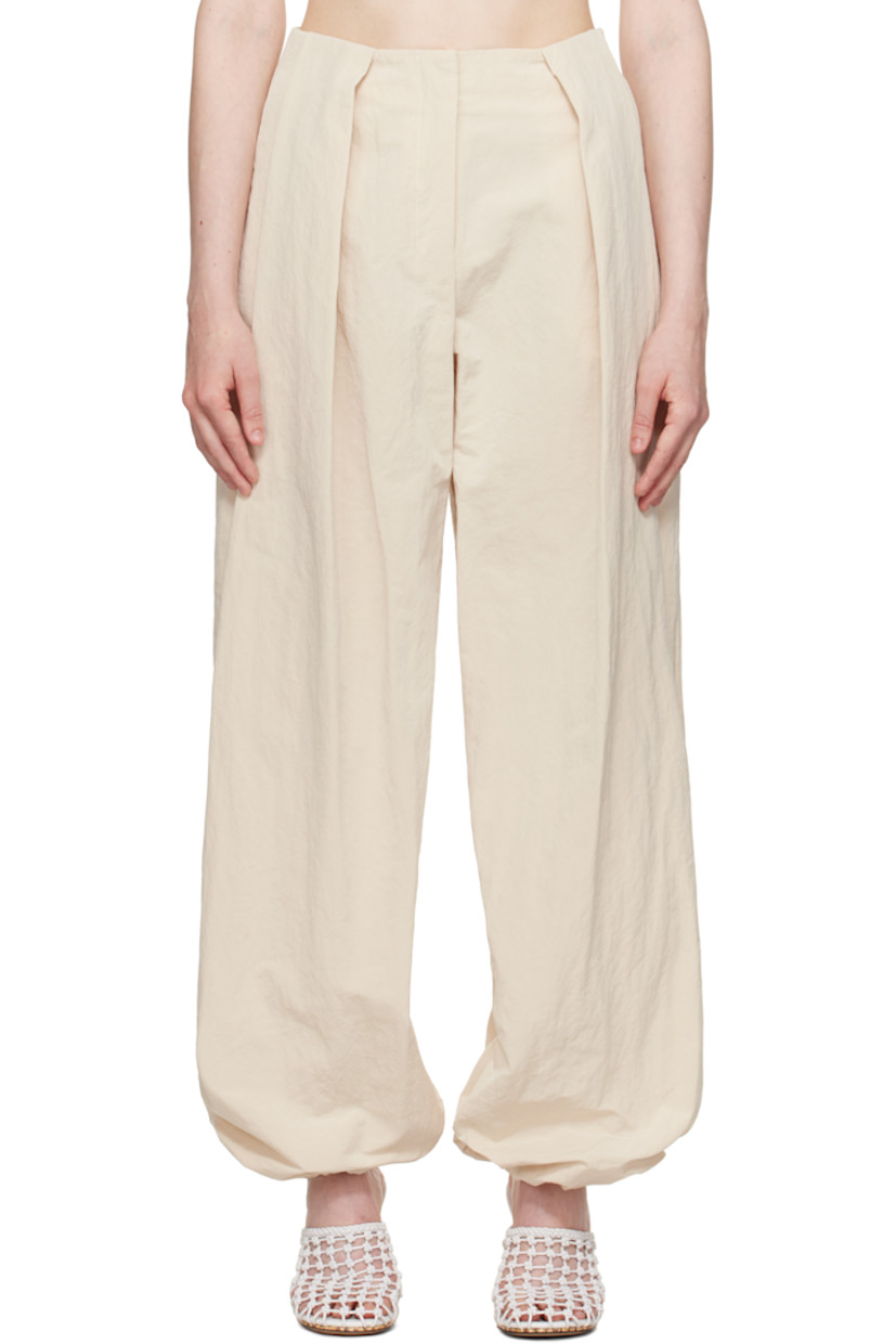 Wide-leg crinkled nylon-blend taffeta trousers. 

· Mid-rise 
· Belt loops
· Four-pocket styling 
· Zip fly
· Draped pleats at front 
· Press-stud fastening at gathered cuffs
· Notch at back waistband 
· Logo locker loop at back waist 
 
Part of the La Croisière collection.

Supplier color: Off-white