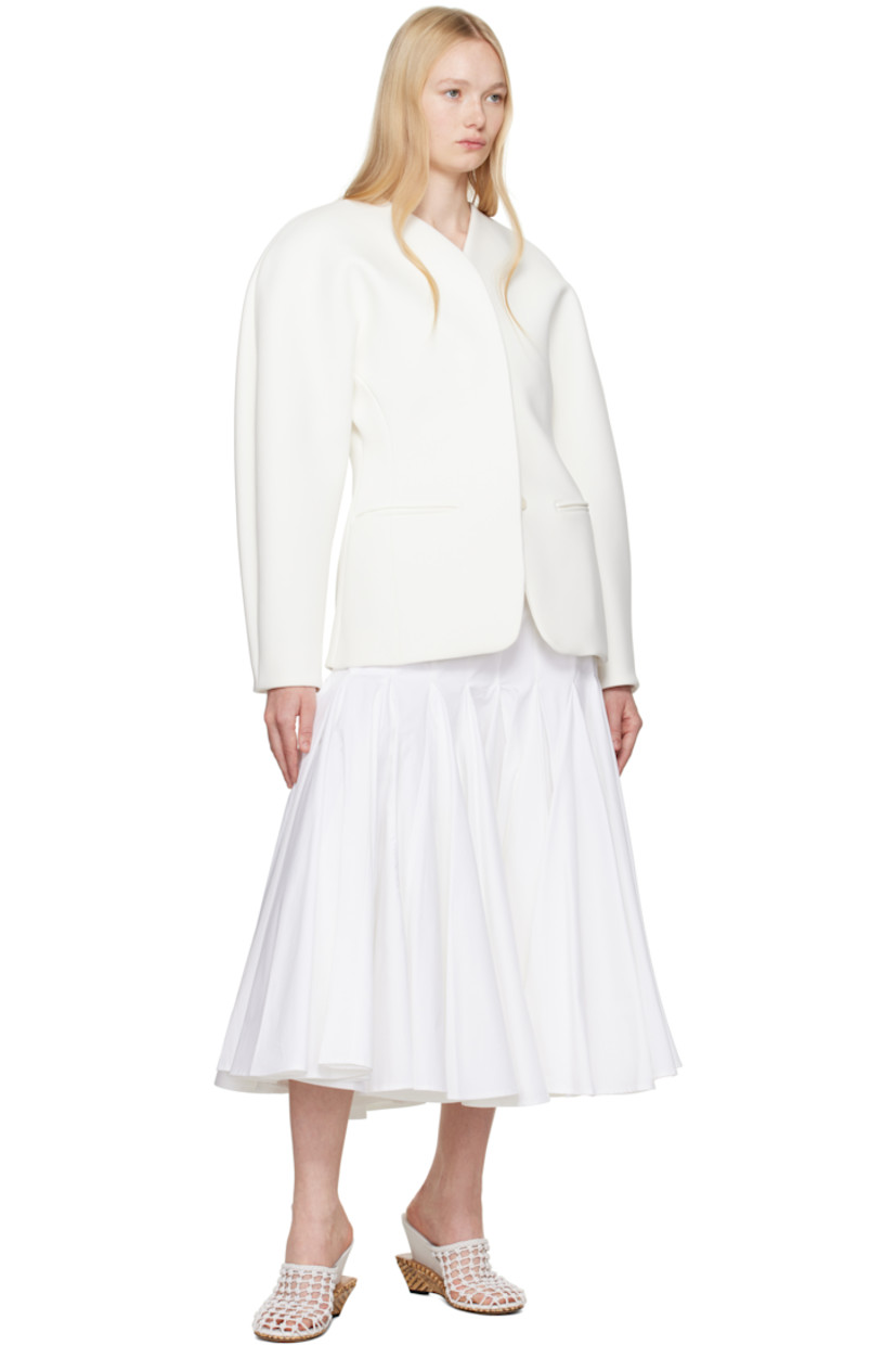 Cotton poplin midi skirt. 

· Belt loops
· Darts at waist
· Single-pocket styling
· Zip fly 
· Godet panels at flared hem
· Full cotton-blend tulle lining

Part of the La Croisière collection.

Supplier color: White
