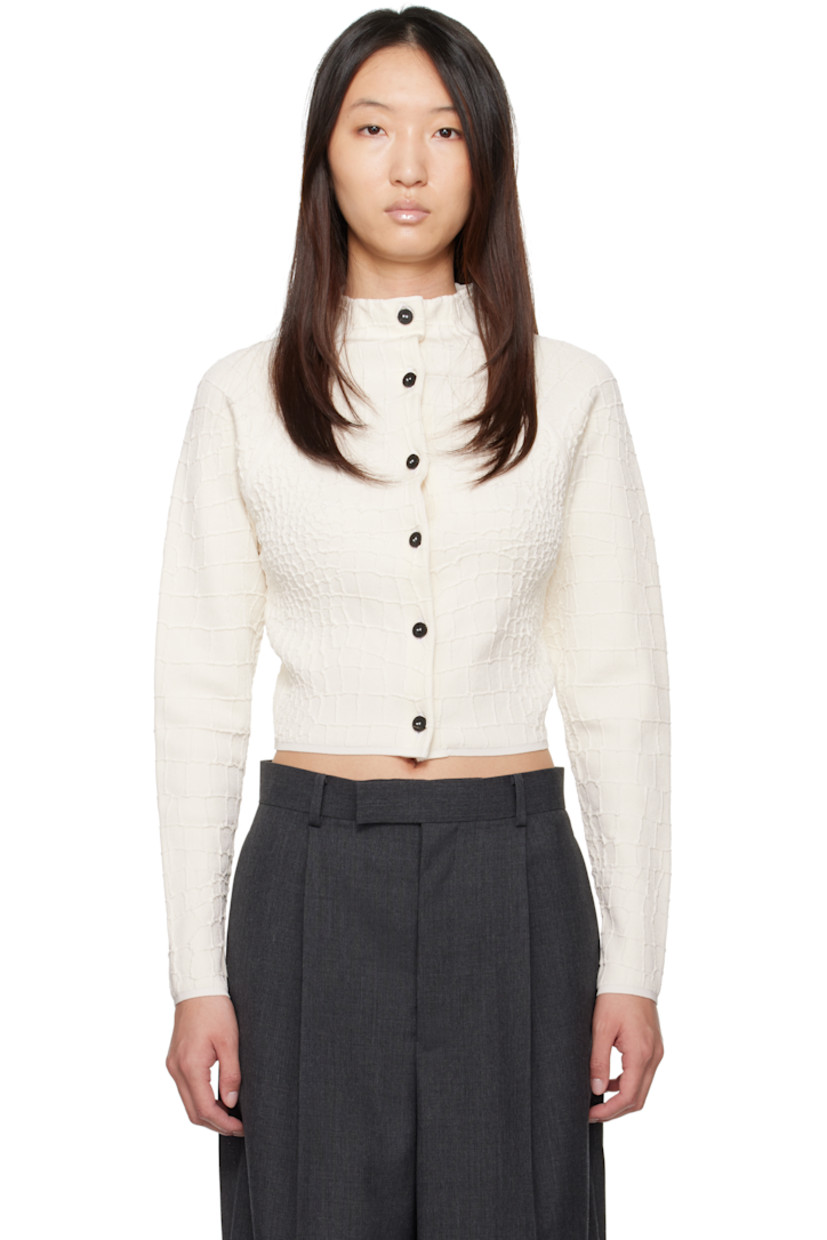 Textured knit stretch viscose-blend cardigan. Graphic pattern and rib-knit trim throughout.

· Mock neck
· Button closure
· Raglan sleeves
· Locker loop at back collar

Part of the La Croisière collection.

Supplier color: Off-white