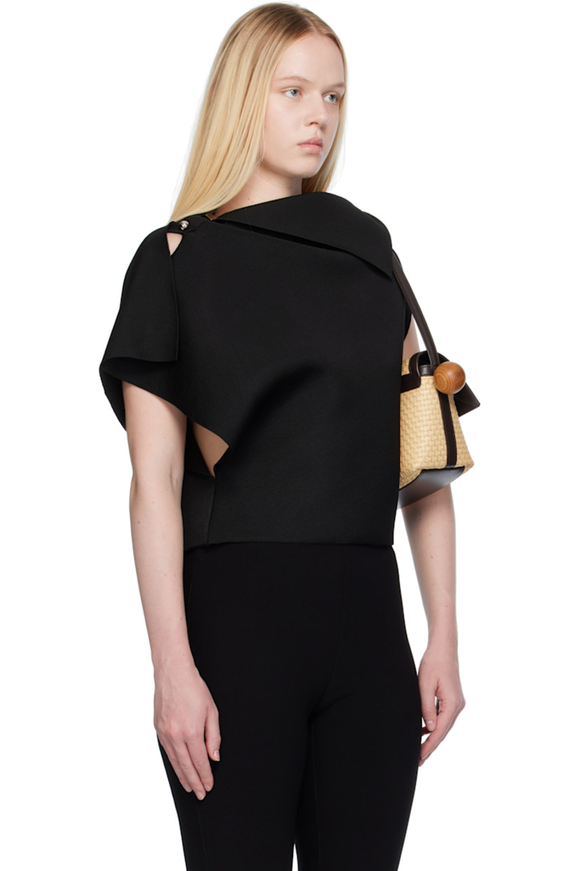 Milano-stitch knit viscose-blend top.

· Asymmetrical construction
· Foldover neck
· Integrated brooch at shoulder
· Silver-tone hardware

Part of the La Croisière collection.

Supplier color: Black