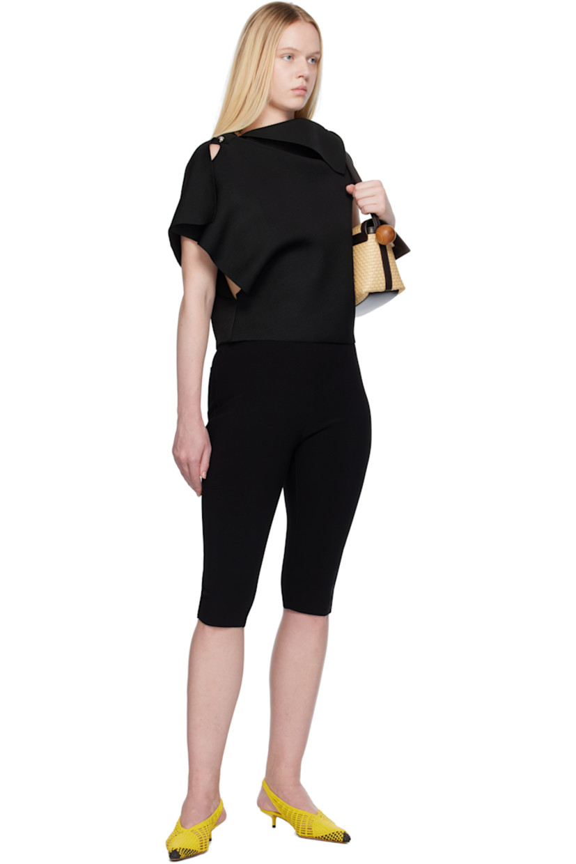 Milano-stitch knit viscose-blend top.

· Asymmetrical construction
· Foldover neck
· Integrated brooch at shoulder
· Silver-tone hardware

Part of the La Croisière collection.

Supplier color: Black