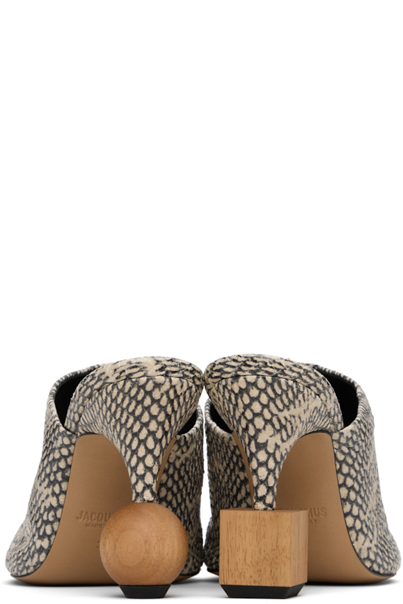 Snakeskin-embossed goatskin mules.

· Mismatched padding at footbed
· Logo-embossed lambskin footbed
· Mismatched wood hardware at covered heel
· Rubber injection at heel
· Leather sole
· Heel: H3.5"

Part of the La Croisière collection.

Supplier color: Beige
