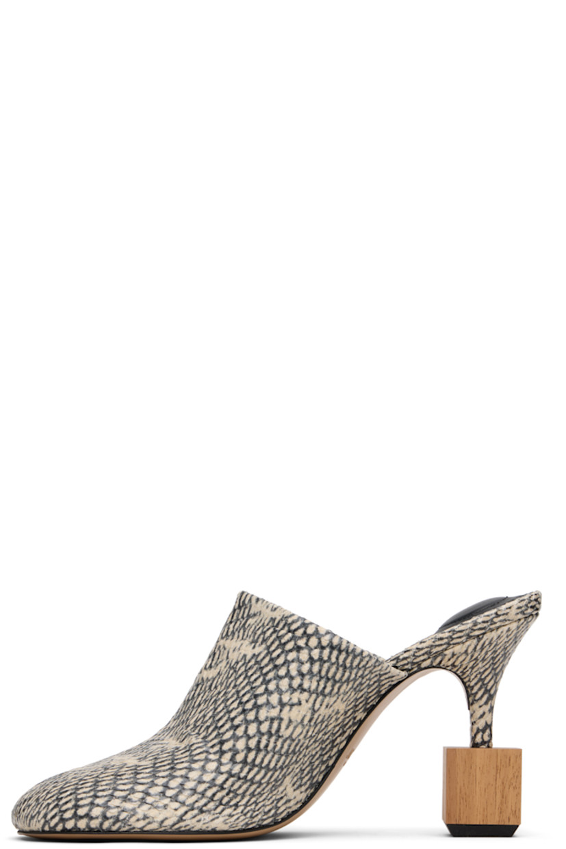 Snakeskin-embossed goatskin mules.

· Mismatched padding at footbed
· Logo-embossed lambskin footbed
· Mismatched wood hardware at covered heel
· Rubber injection at heel
· Leather sole
· Heel: H3.5"

Part of the La Croisière collection.

Supplier color: Beige