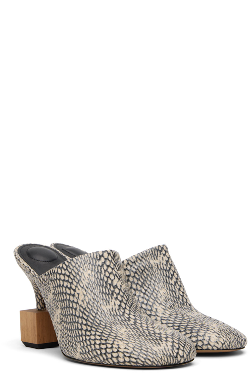 Snakeskin-embossed goatskin mules.

· Mismatched padding at footbed
· Logo-embossed lambskin footbed
· Mismatched wood hardware at covered heel
· Rubber injection at heel
· Leather sole
· Heel: H3.5"

Part of the La Croisière collection.

Supplier color: Beige